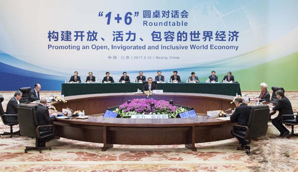 李克強(qiáng)同主要國際經(jīng)濟(jì)金融機(jī)構(gòu)負(fù)責(zé)人舉行“1+6”圓桌對話會——共商構(gòu)建開放、活力、包容的世界經(jīng)濟(jì)